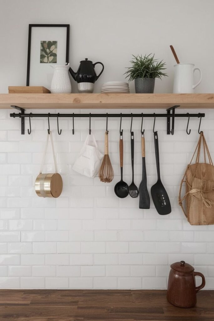 Wall rail with hanging utensils and mugs